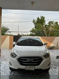 توسان ٢٠١٤ • أبيض • ١٢١٦٤٧ كم