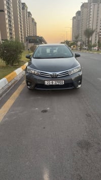 تيوتا كورولا خليجي موديل ٢٠١٤ كفاله صبغ بدون حادث محرك ٢٠٠٠دوش تبريد ث...
