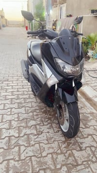 N MAX للبيع دراجة خير من الله مابيها نقص غير بس الجامة الأمامية الباقي...
