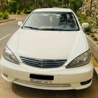كاميري للبيع موديل 2006  خليجي رقم بغداد مشروع وطني محرك وكير مكفول مح...