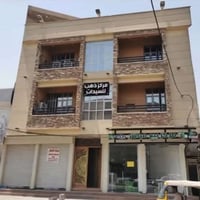 عماره جديده للبيع بغداد لمشتل شارع جامع عدد شقق ٨ عدد المحلات ٤ الوارد...
