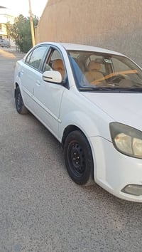 كيا ريو 2011 محرك 1600 وارد خليجي  بغداد البلديات  السعر 98  ورقه هاتف...