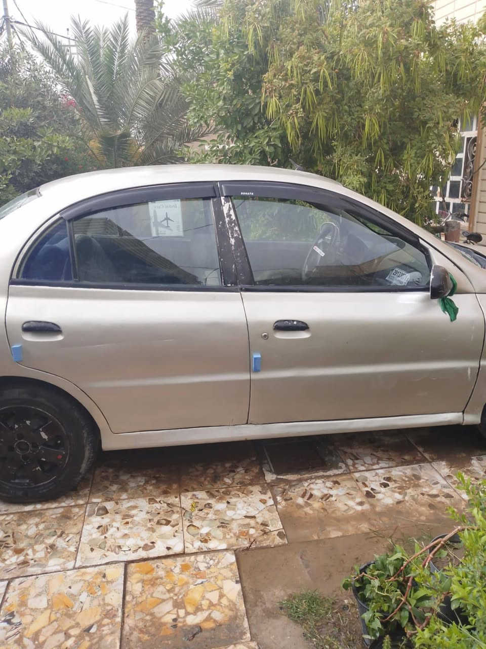 ريو موديل 2000 كير محرك نضيفات مصبوغه عام حداديه زينه مكان السياره بابل كهربايات كله شغاله السعر 25 او بيه مجال قليل ***********  كير عادي
