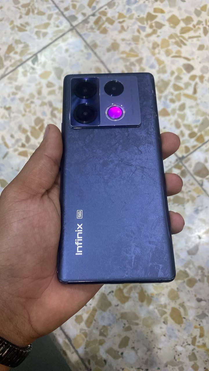Infinix NOTE 40 Pro 5G
ذاكرة 256
دبل شريحه 
سلاسة بالالعاب 
كامرة اتصال تكنيك صوت كله يخبل 
بصمه اصبع شاشه وبصمه وجه 
بي فطر بالضهر خفيف ممأثر 
بدون ملحقات 
السعر: 285 وبي مجال 
العنوان : بغداد مدينة الصدر 
متواجد فقط واتساب ‏‪***********‬‏

نص مكتوب في الصور:
- هاتفي XOS 15.1.2 استنادا إلى Android التحقق من التحديثات اسم الجهاز Infinix NOTE 40 Pro 5G التخزين ٤١,٤٧ غ.ب / ٢٥٦ غ.ب الطراز Infinix X6851 وحدة المعالجة المركزية Dimensity 7020 RAM 8.00 GB+5.00 GB الكاميرا الخلفية 108M TRIPLE Camera الكاميرا الأمامية 32M البطارية 5000mAh الشاشة 1080x2436
