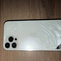 ايفون 12برو ماكس   لون ابيض🤍  ذاكرة512  بطارية76 🔋  الجهاز مكسور ظهر ف...