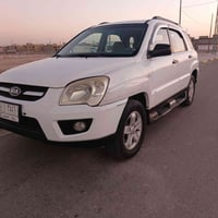 سبورتج ٢٠٠٩ • محرك وجير مكفول • الكوت داموك
