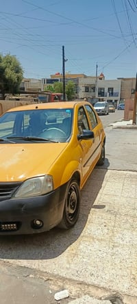 رينو لوجان • ٢٠١٠ • كمبريسر واكف