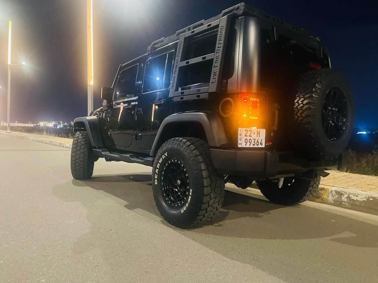 سلام عليكم 👋👋👋👋🏿
Jeep wrangler UNLIMITE SPORT ⛰️ 4x4 2017
• ⛽ بنزين كامل
V6• 
• 
🛠️ الإضافات والتعديلات (بقيمة تزيد عن 8,000$)
الترفيـع والتعليـق (Rough Country):
• ترفيعة تعليق 2.5 إنش + رفعة بدي 1.25 إنش.
• دبل ستيرن مزدوج + تراك بار متغير.
تايرات 37
الإضاءة والكهربائيات:
• لايتات أمامية وبروجكترات ”بروجكترات جبال.
• إنارة شباك ملون + ليد سبير خلفي + 
• لوحة تحكم بالإنارة (AUX) وايرلس + جهاز تشغيل أمريكي.
الإضافات الخارجية والداخلية:
• وينج (Winch) قوة 6 طن + شوتة خارجية (Snorkel).
• دوسات جانبية كهربائية م + سقف تخيم  
• إنارة داخلية مع مخارج تبريد مميزة + 
• كاميرا أمامية مدمجة مع المرآة الداخلية+ حساسات أمامية وخلفية.
معدات التخييم والرحلات:
• سيباية سقف مع إنارة + 
• ميز سفرات مدمج بالصندوق الخلفي.
• أبواب صيفية إضافية مع القواعد الخاصة بها.
• إضافات وأكسسوارات متفرقة أخرى

حادث 
بدون بدون ايرباك‼️‼️‼️
ملاحظة كل القطع.  اصلية  
مكان بغداد / مجمع ايادي العدل 
السعر 205$ بيها مجال بسيط واتساب متوفر👍  ***********
