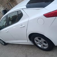 اوبتيما ٢٠١٤ • دواخل جلد • محرك وكير مكفولات