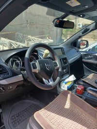 دوج كرفان موديل ١٩ جيتي ماشيه ٦٧  حادثهه قبق جنطه فقط  رقم بغداد بسمي ...