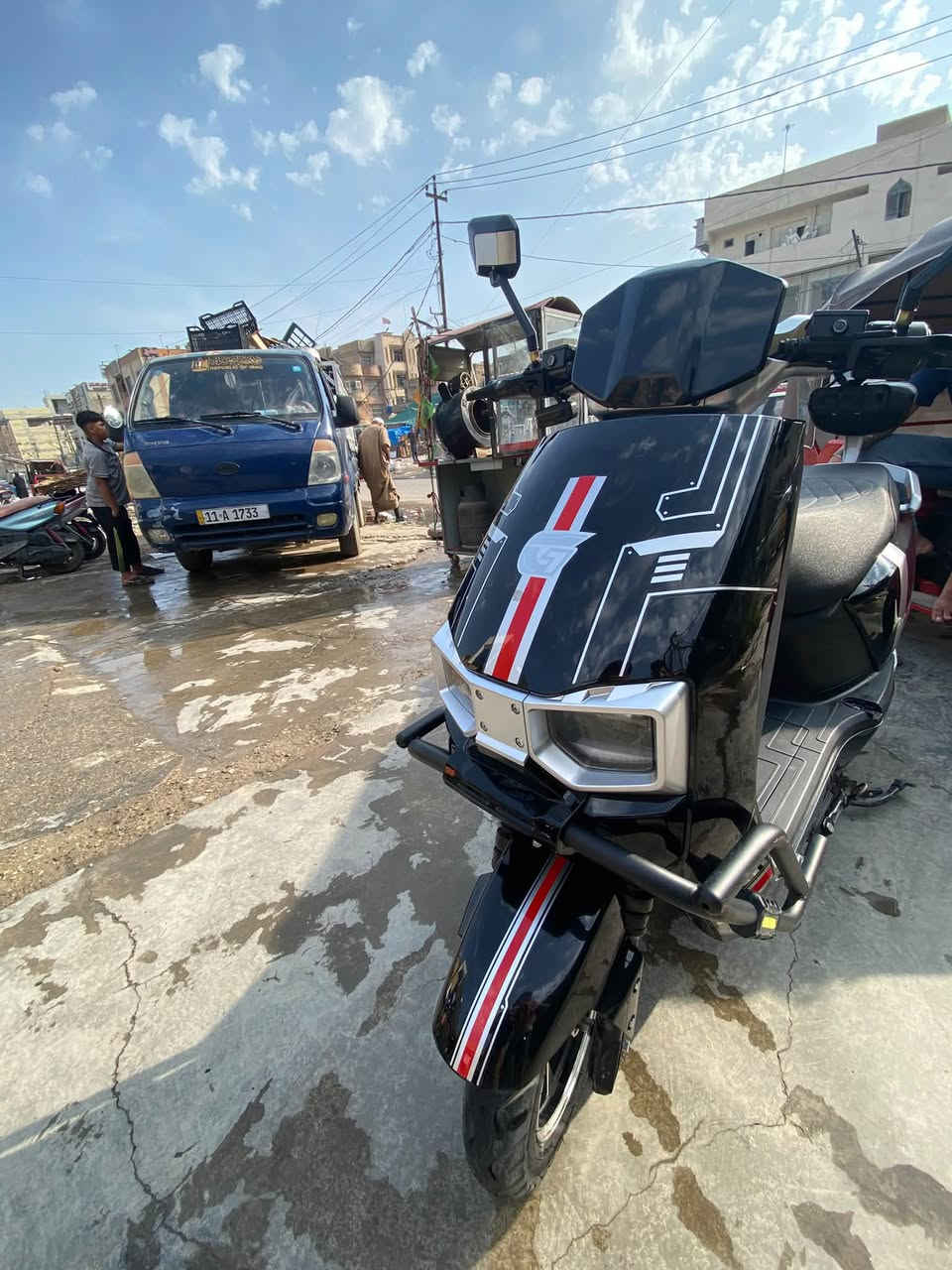 دراجة شحن • بطاريات مبدلة • شارع المطبك