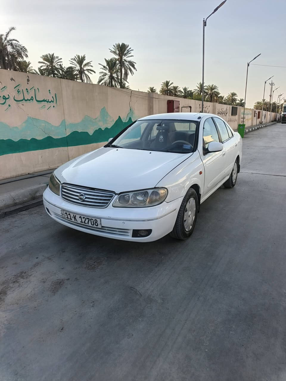 السلام عليكم اخوان عندي نيسان سني ٢٠٠٥ ياباني للبيع رقم بغداد باسمي ( هزه + اراقام انكليزي + سنويه) جدد 
السياره جانت صفره ورجعت بيضه ( بسبب قرار المرور) والسياره اصلها لون ابيض بيها طخه بالجاملغ الامامي فقط 

اخوان السياره تخبل وناعمه مال جناي 
( كير + مكينه + حداديه امامي خلفي +تبريد ثلج شرط + كهربائيات + تخم تاير) كلهن جدد ومكفولات 
السياره وارد سعودي بطاين صاج وجام كهرباء ومري كهرباء مسجل بلوتوث واواكس 
السياره صافيه وناعمه اخوان مال جناي وسعرها مناسب 

السعر ٦٣ مكاني بغداد ابو غريب 
للاستفسار *********** او ***********
