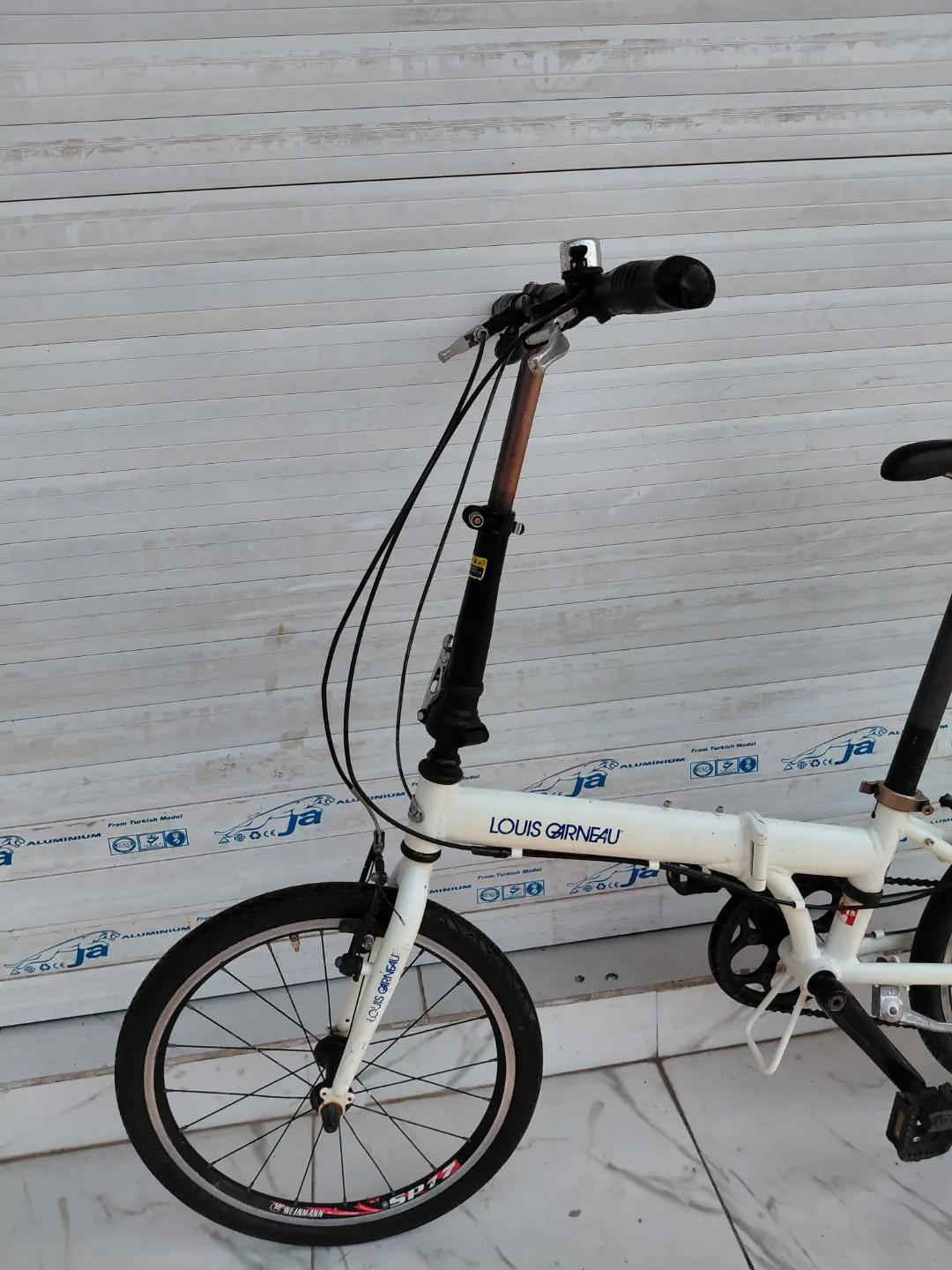 LOUIS GARNEAU FOLDING BIKE حجم 20 المنيوم بالكامل    ✈يوجد توصيل لجميع المحافضات ✈ كركوك مدخل سايدين حي الاسرى والمفقودين  معرض ابو شيفان ( *********** )
