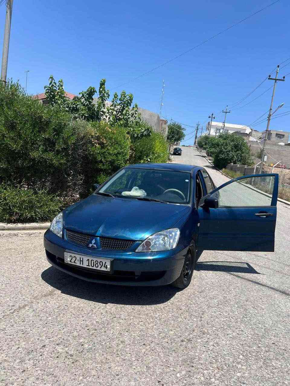 لانسر • ٢٠٠٨ • باب مصبوغ