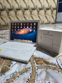 لابتوب ابل • شغال • بصره دور الشرطة