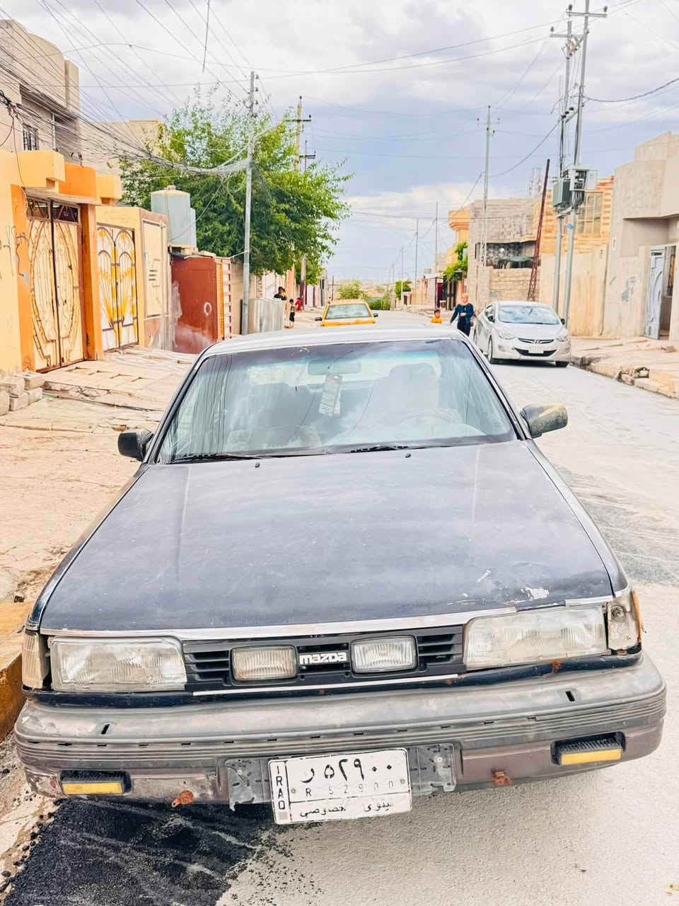 بيع مستعجل                             مازدا موديل 1987 رقم الماني سنويهً خضرة طخم تايات ويلكب مكينه 12 بخ محرك گير نضيف دشبولها كامل شغاله وايرمنيه جاهزة شرط الوكاله والتحويل والصور گدام العين السيارة جاهزة انطيك من الدعاميه للدعاميه سيارة كلشي مايعوزها السعر 20. وبيها مجال للطيبين   *********** بي واتساب مكاني تل الرمان الرقم الثاني ***********
