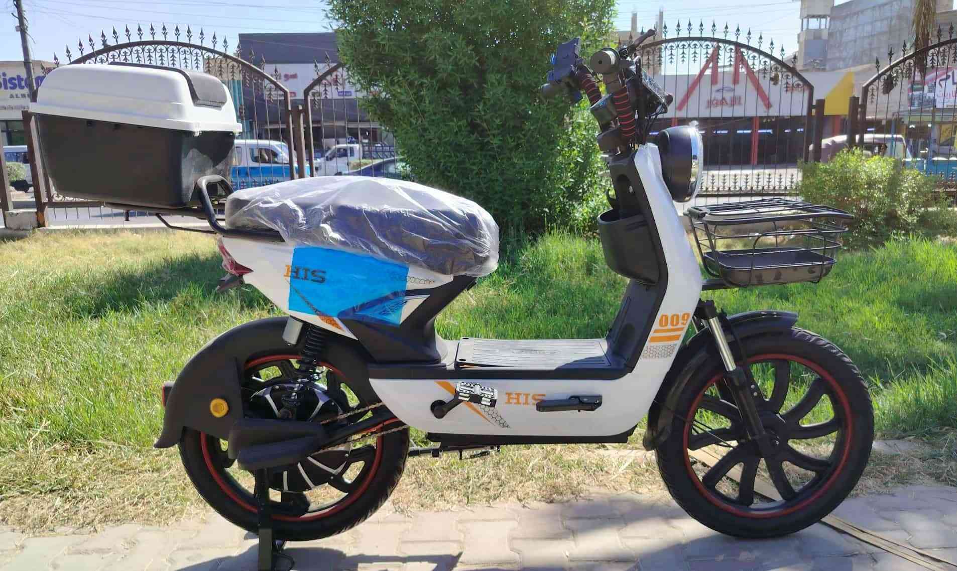 جديد دراجة شحن   من شركة  HIS الرصينة والمعروفة
بالكارتون وبدون بطاريات وبسعر 375
☘️ 5 بطاريات دبل
☘️ قوة الملف 1500 واط
☘️بوكس خلفي
☘️كشن  عالي
☘️سلة مميزة
☘️لد امامي قوي
☘️حامل وشاحن موبايل
☘️ ام بي 3 MP3
☘️تلائم جميع الاعمار والاغراض
☘️اقتصادية
☘️اعتمادية
☘️رصينة وقوية
☘️نظام انارة متكامل السرعة القصوى  تتجاوز الـ  60 كيلو متر بالساعة حقيقية - 4 سرع
☘️بصمة العدد 2 – سويج عدد2  –-كارت NFC عدد 2  -جهاز انذار ضد السرقة
 ممكن تشغيلها بالكارت او السويج او البصمة
☘️☘️☘️ السعر :  375  الف دينار عراقي بدون بطاريات وبالكارتون☘️☘️
محل الورقة الخضراء للدراجات الكهربائية الشحن  ☘️ 🛵
بغداد – شارع الربيع – مقابل الامثل للمطابخ – قرب مدخل دور نواب الضباط في الحرية للتواصل : واتساب *********** – ***********

نص مكتوب في الصور:
- صيانة و تصليح
- ادوات احتياطية
- صيانة موقعية
- بيع و شراء
- دراجة - ستوتة - سكوتر
- عجلات ذوي الاحتياجات الخاصة
- بغداد-شارع الربيع -مقابل الأمثل للمطابخ
- قرب مدخل دور نواب الضباط في مدينة الحرية
- محمد ابو غيث
- ***********
- ***********
- الورقة الخضراء
- للدراجات الكهربائية