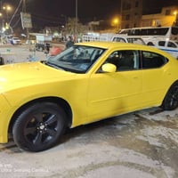 جارجر 2010للبيع سيارة جاهزه خطها نجف بغداد السعر 100 وبيها مجال  الرقم...