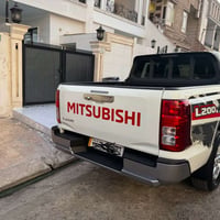ميتسوبوشي L200 موديل ٢٠٢٥ ماشي ٢٩٠٠٠ دبل اكسل تحكم سترين شاشه كاميره ب...