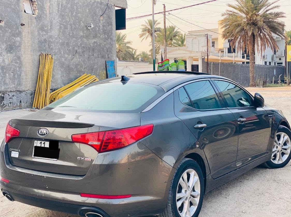 السلام عليكم كيا اوبتمه موديل ٢٠١٣ رقم بغداد بسمي وارد امريكي حادث جاملغ وبنيد وبيه صبغ  بابين اثر جراد السياره فول مواصفات 1/1 مكينه وكير وحدادي وتبريد شرط الفحص مكان السياره بابل السعر ١٠٠ وبيه مجال ***********
