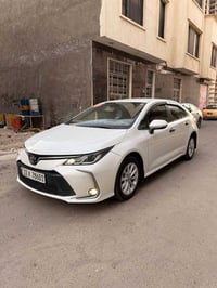تويوتا كورلا 2022 خليجي   مواصفات GLI  محرك 1800 بانزين  بصمة ابواب + ...