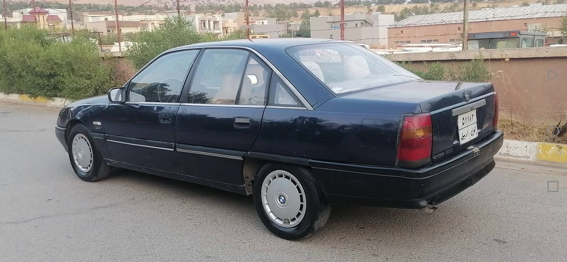 اوبل اوميغا • توماتيك • ١٩٩٠