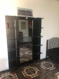 مرايا • رفوف • بغداد الجديدة