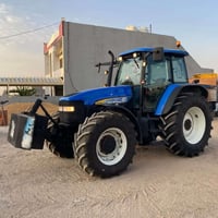 نيوهولاند TM155 • ٢٠٠٤ • لودر مركب