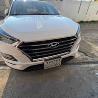 تكسون ٢٠٢٠ • اسود • بصمة