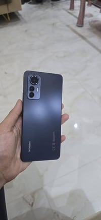 مي 12 لايت • ٢٥٦ غيغا • شاشة اموليد ١٢٠ هرتز