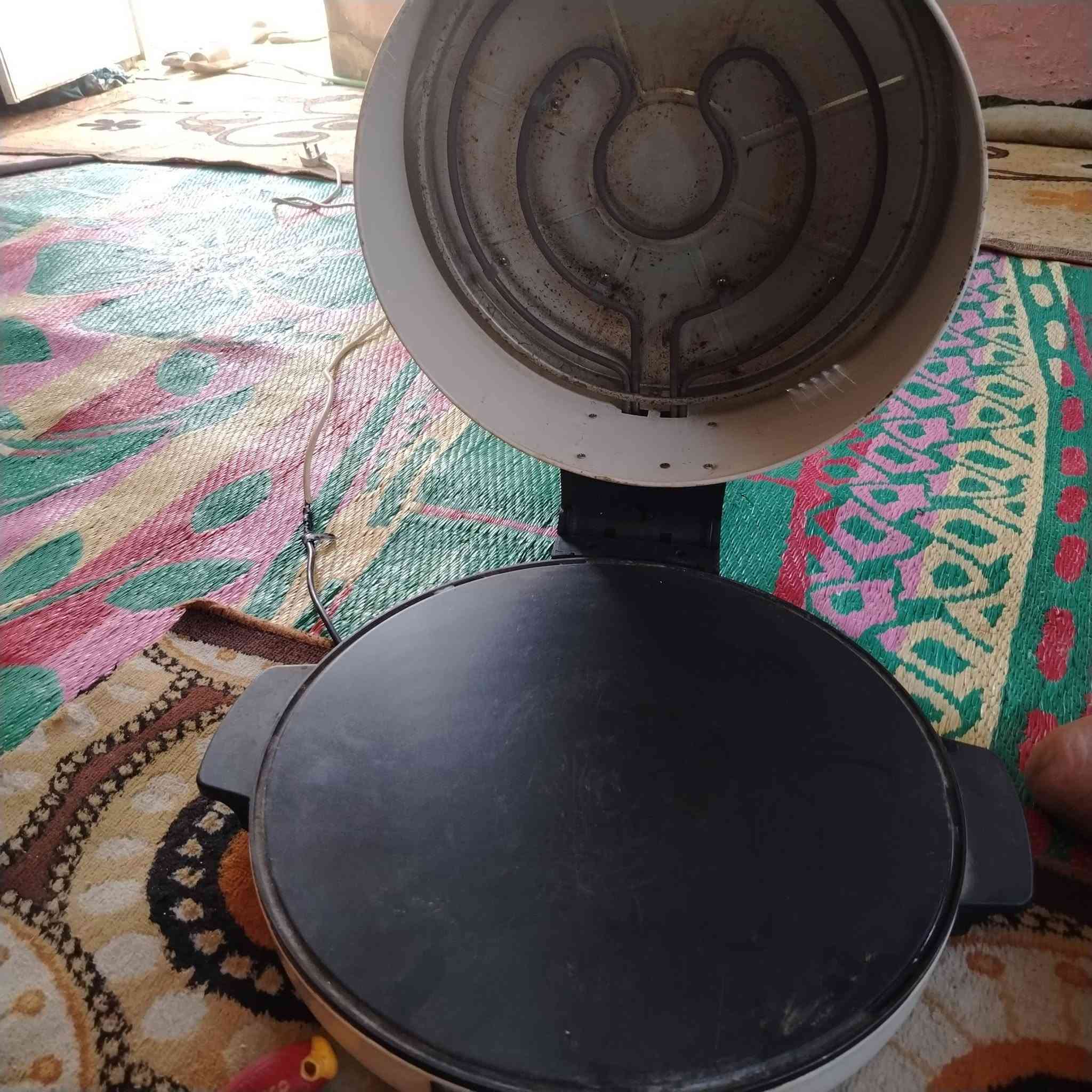 فرن وخبازة كهربائيه السعر٢٥فقل شرط الشغل ما طاب تصليح ابد
