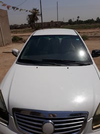 جيلي موبيل • أبيض • خدش خلفي