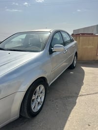 اوپترا ٢٠٠٤ • سلفر • باسمي تحويل