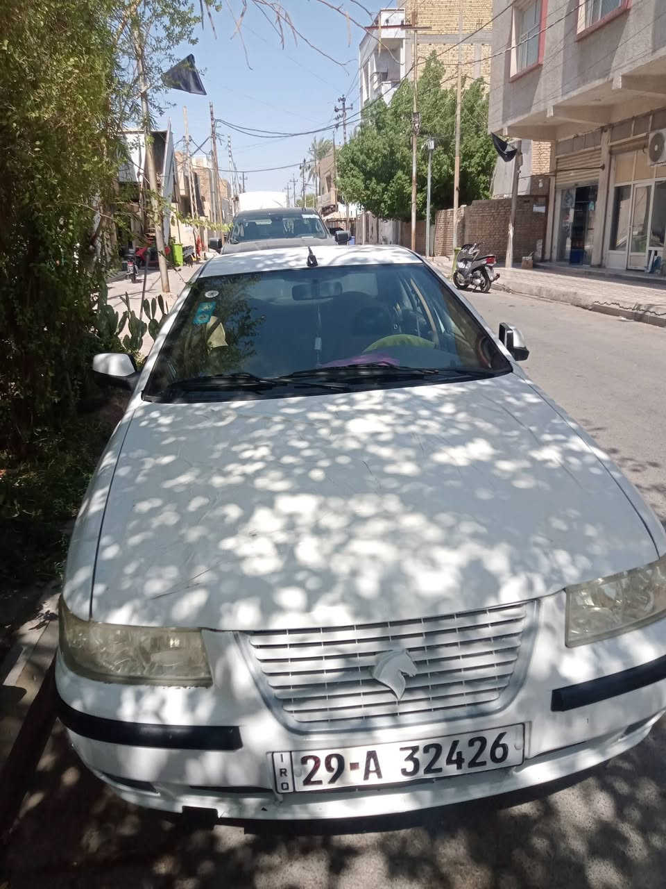 السلام عليكم سمند  ابيض موديل 11 رقم واسط انكليزي راعيهه بلكوت  ب37  بيه مجال ***********
