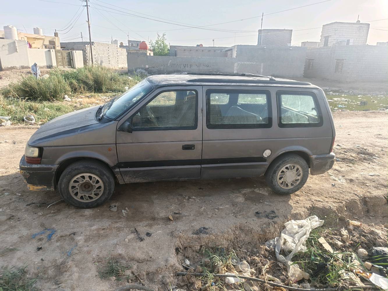 دوج كرايسلر ٩٢ نضيفه رقم ديالى مشروع وطني للبيع او مراوس بسياره ٧ راكب غير نوع او محور  ٤١ وبيها مجال
