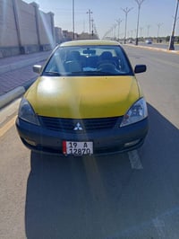 لانسر ميتسوبيشي • ٢٠٠٩ • رقم كربلاء