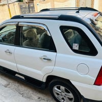 سبورتج 2009 فول مواصفات خليجي مكفولة من الصبغ والضربة بيها بارد يم قبق...
