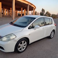 نیسان تیدە ی یابانی مودیل 2008 گیر ئۆتۆماتیِک ناو زە ردە و چوار جام کا...
