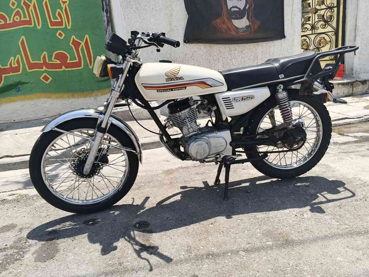 ايرانية 4 كير دراجة نضيفة شغالة كاملة وياهة جنطة مال دلفري ب 450 مكان بغداد الجديدة ***********

