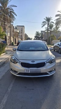 كيا فورتي موديل 2015 وارد امريكي رقم بغداد دولي بأسمي  ماشيه 80 الف مي...