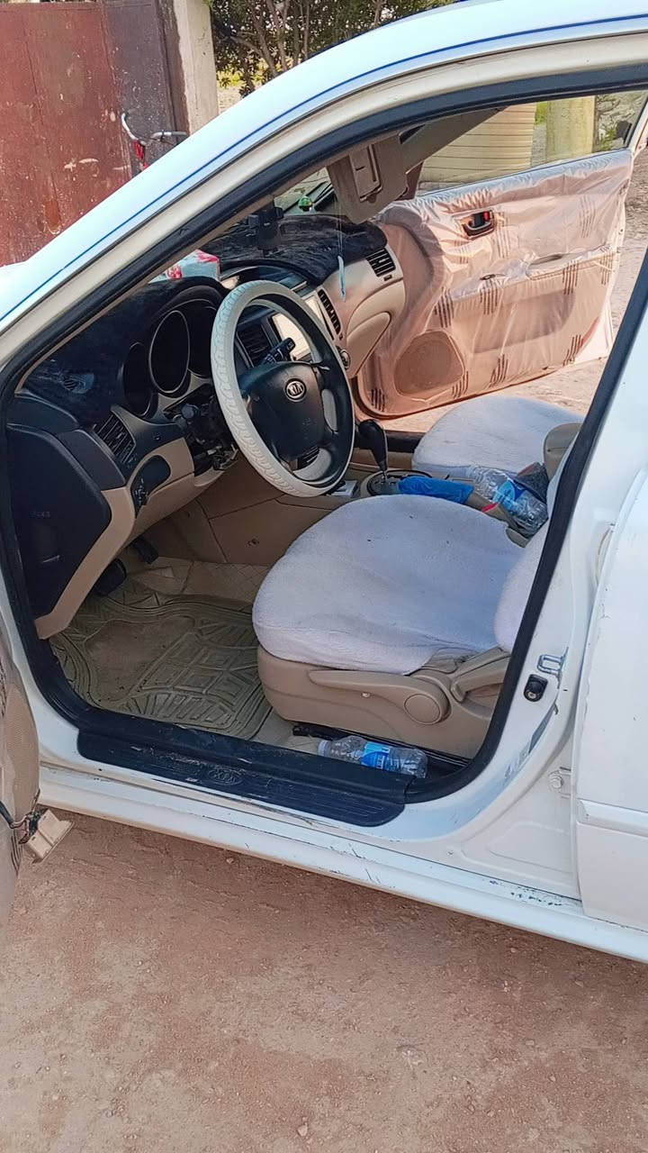 السلام عليكم كيا اوبتيما خليجي موديل ٢٠١٠
رقم اربيل الدولي 
بيه رشات صبغ بس اني ابيع صفحه بدون حادث بدون كص بدون فتح بدون معجون فقط رشه 
تاير تبريد 
مكينه جديده 
بانزين+غاز تانكي ابو ٦٠ 
مكانه نجف ابو صخير 
السعر ٩٣ وبيه مجال قليل 
***********
