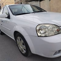 عندي وبترا2012 بيه باب خلفي صبغ اثر شخط الباقي مكفوله كير ومكينه جدد ت...