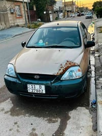كيا ريو 2004 تبريد ثلج/ اوتو سنوية لحد 2027 السعر  خاص 07728804785 بغد...