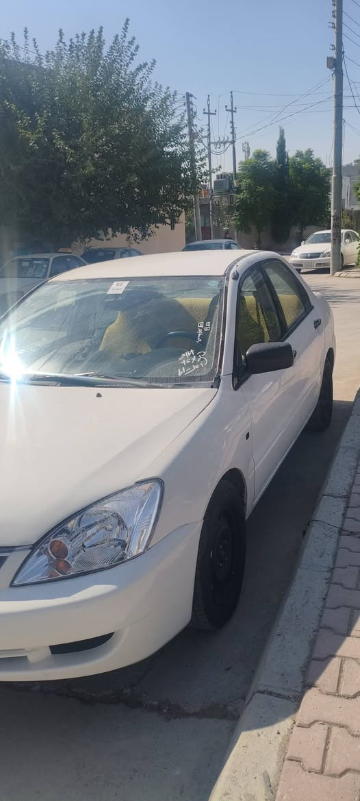 لانسر ٢٠٠٤ • مكينة ٢٠٠٧ • جير عادي