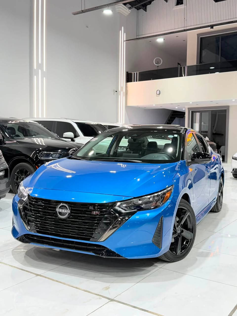 🔥 نيسان سنترا 2024 SR Plus 🇺🇸
بدون صبغ بدون ارباك فقط جاملغ سكن كلير امريكا 
إذا تريد سيارة شكل رياضي، اقتصادية، ومواصفاتها مرتبة… السنترا SR Plus اختيار قوي 👌

🚗 محرك 2.0 لتر 4 سلندر
⚙️ كير CVT أوتوماتيك
🏁 فئة SR Plus بستايل رياضي مميز
💡 إنارة LED
🛞 ويل رياضية
🕷️سقف اسود 
🎼 نضام صوتي سماعات BOSE
📱 شاشة مع Apple CarPlay و Android Auto
🛋️ داخلية مرتبة ومريحة
🛡️ أنظمة أمان ومساعدة للسائق
⛽ اقتصادية بالبنزين ومناسبة للاستخدام اليومي

✨ سيارة عملية ومرتبة، وبنفس الوقت شكلها شبابي ورياضي.

📍 متوفرة للبيع – أربيل
📞***********
بدون رقم تترقم جميع محافظات كردستان
السعر بلاش جوه السوك 148$ وبيها مجال
