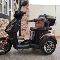 دراجة ثلاثية • بطاريات جديدة • تايرات جدد