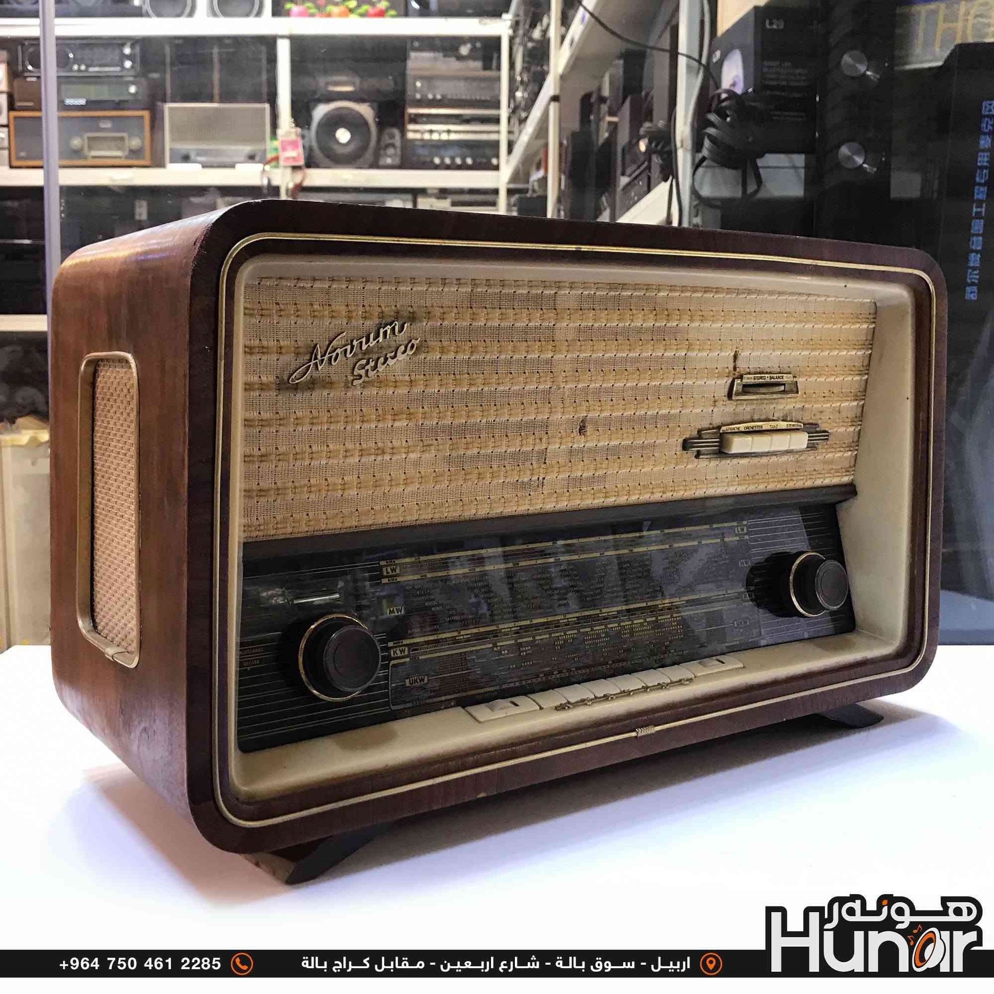 KORTING RADIO CLASSIC FM
هذا الجهاز هو راديو لامابي (أنبوبي / Vacuum Tube) ألماني كلاسيكي من طراز Novrum Stereo (صُنع بواسطة شركة Körting لشركة Delmonico).

​تفاصيل الجهاز:

​الموجات (عدد الموجات/الموجات المتاحة): يحتوي على 4 موجات رئيسية يُمكن التبديل بينها عبر مفاتيح التحكم والأزرار في واجهة الترددات: 
​عمر الراديو: 

​سنة الصنع: صُنع هذا الطراز في بداية ستينيات القرن الماضي (حوالي 1961 - 1964). 

​العمر: يتجاوز عمره 60 عاماً (نحو 62 إلى 65 سنة). 

​ملاحظات إضافية: 
( کوردی • عربي )

🟢توصيل موجود الي جميع المحافضات
🟡گەياندن هەیە بۆ هەموو شوێنێک

🟠مــعـرض هــونـەر
🔸للـصوتــیات(امبلیفایر• سماعة• رادیو• انتیك• مایكروفون)
🔸عــنـوان• اربیل سوق بالة • شارع اربعین
🔸مـوبایـل• ***********
                   ***********

🔵پـێـشانـگای هــونـەر
🔹بۆ ئامێری دەنگی و کارەبایی(ئیمپلیفایر• سەماعە• ڕادیۆ• مایکرۆفۆن)
🔹ناونیـشان• هەولیر • بازاری لەنگەی ٤۰م
🔹مـــۆبـایـل• 
***********
***********

•••••••••••••••••••••••••••••••••••••••••••••••••••
#iraq #kurdistan #duhok #zaxo #hawler #karbala #slemani #erbil #baghdad #kurd #kurdish #akre  #karkuk #kuwait #najaf
#amplifier #audio #subwoofer #sound #music #audiophile #bass #stereo #amplifiers #speaker #soundsystem #speakers
#اربيل #العراق #بغداد
​بلد المنشأ: ألمانيا الغربية (Western Germany).

​النظام: يعمل بتقنية الصمامات المفرغة (Vacuum Tubes) ويدعم الصوت الاستريو (Stereo).

​التصميم: الهيكل خارجي مصنوع من الخشب الطبيعي

​UKW / FM (موجات إف إم / الترددات العالية جداً)

​KW / SW (الموجة القصيرة - Short Wave)

​MW / AM (الموجة المتوسطة - Medium Wave)

​LW (الموجة الطويلة - Long Wave)

​عمر الراديو:

نص مكتوب في الصور:
- 32cm 54cm 22cm +964 750 461 2285 اربيل - سوق بالة - شارع اربعين - مقابل كراج بالة Hunar هونه ر
- +964 750 461 2285 اربيل - سوق بالة - شارع اربعين - مقابل كراج بالة Hunar
- +964 750 461 2285 اربيل - سوق بالة - شارع اربعين - مقابل كراج بالة
- +964 750 461 2285 اربيل - سوق بالة - شارع اربعين - مقابل كراج بالة Hunor
- +964 750 461 2285 اربيل - سوق بالة - شارع اربعين - مقابل كراج بالة هونر Hunar
- +964 750 461 2285 اربيل - سوق بالة - شارع اربعين - مقابل كراج بالة Húnor
- +964 750 461 2285 اربيل - سوق بالة - شارع اربعين - مقابل كراج بالة هنور Hunar