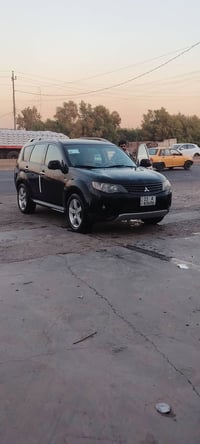 للبيع ميتسوبيشي اوتلاندر 2009 رقم بغداد بسمي  سياره جاهزه  ماشيه 260 ا...