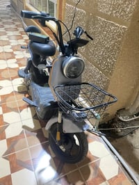 دراجة شحن • بطاريات نضيفة • بصمة