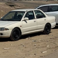 بروتون 2002 مكينة +تخم تاير تبريد خير من الله  مكلف بلـنشر  رقم صاحب ا...